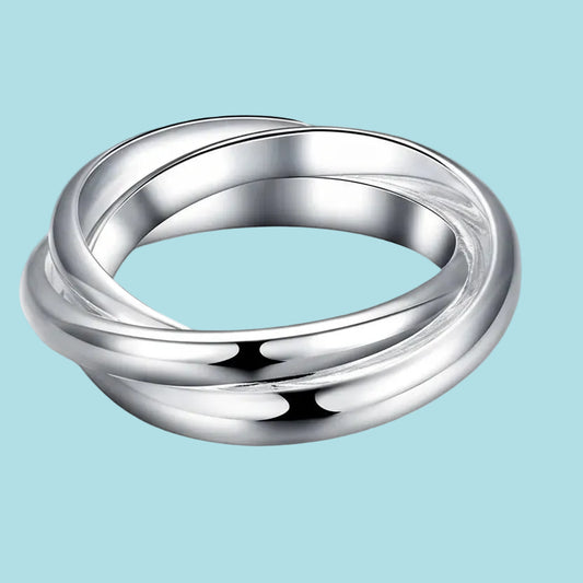 Silver ring with 'Real Sterling 925' stamp on a white background