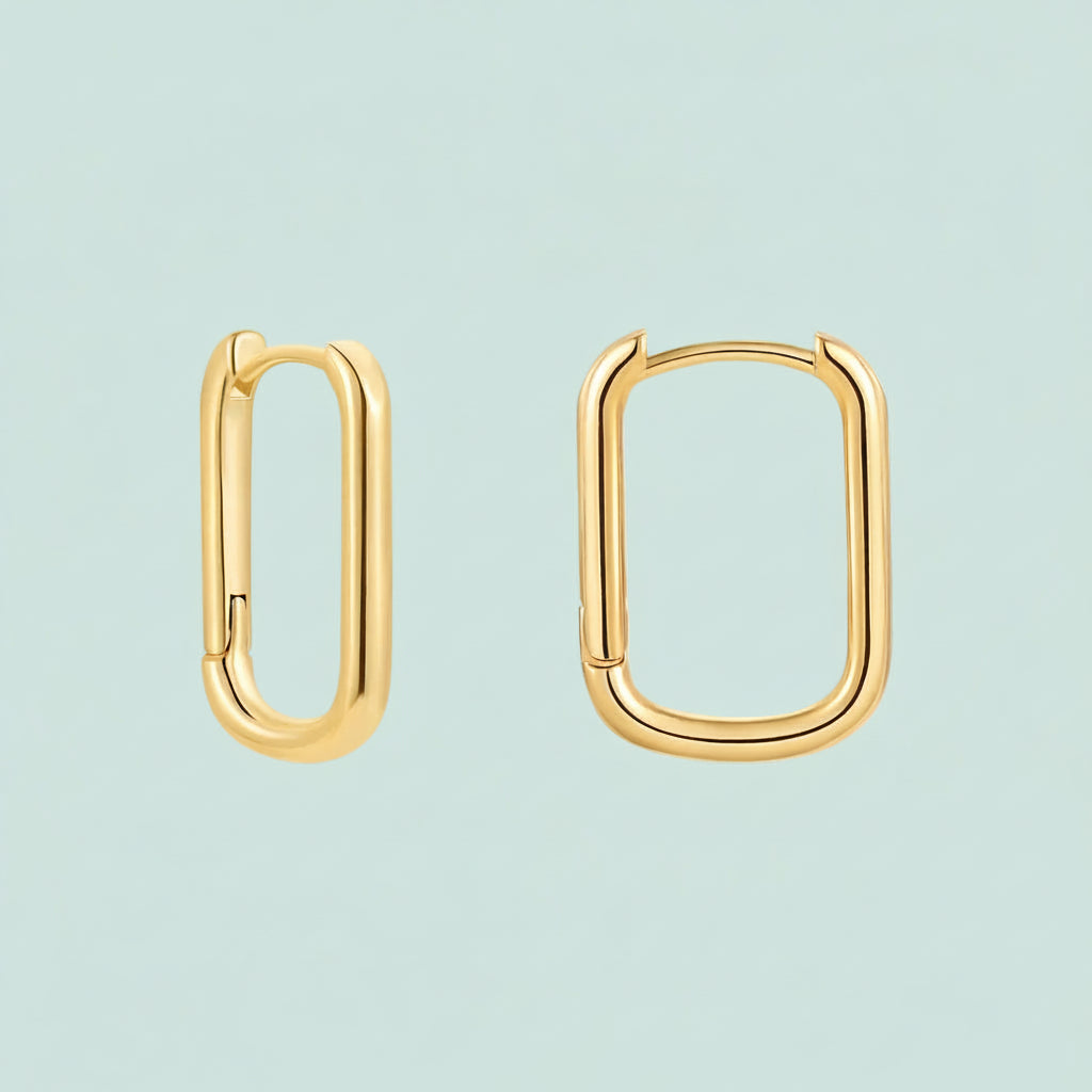 Gold hoop earrings on a white background