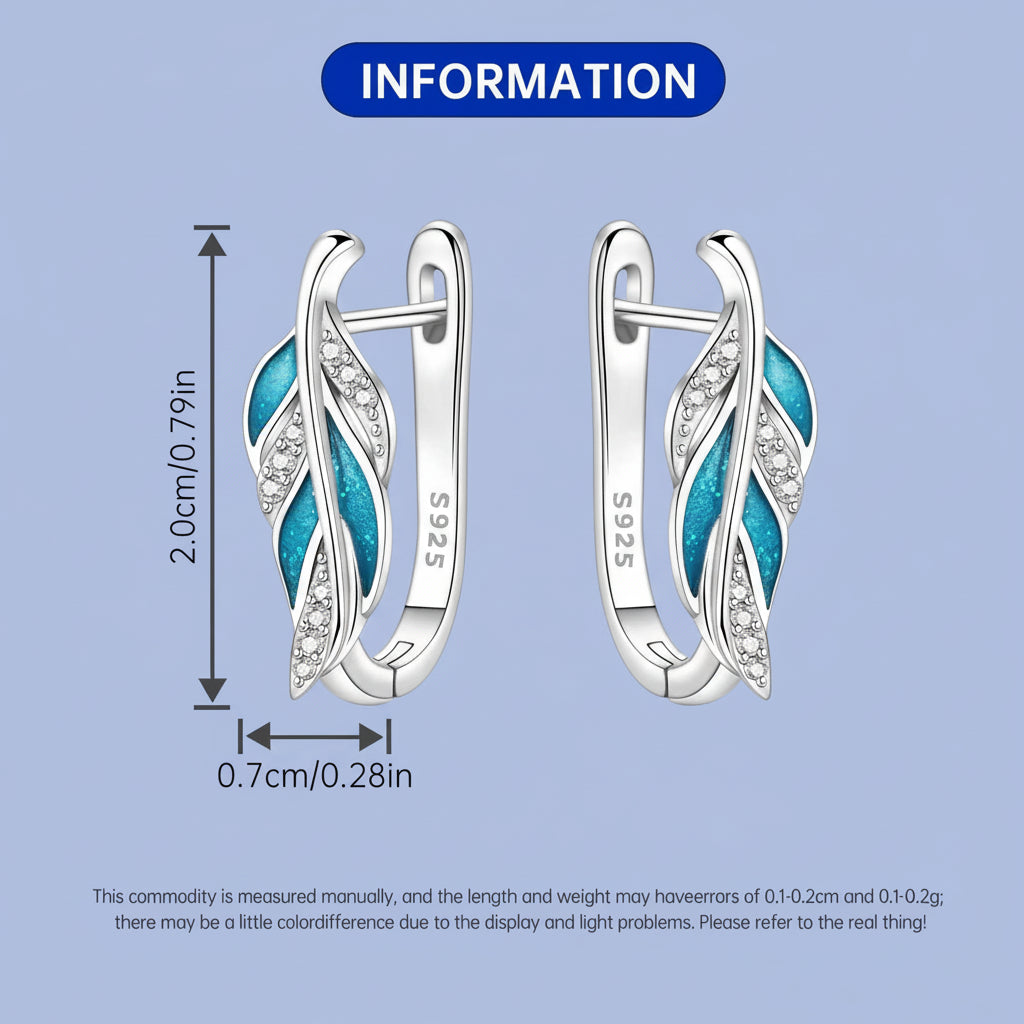 Silver earrings with blue accents and measurement details on a white background