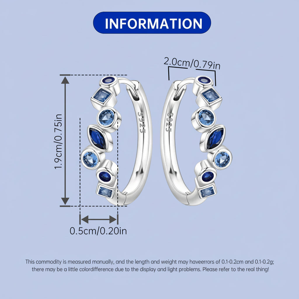 Silver hoop earrings with blue gemstones and measurement details on a light blue background