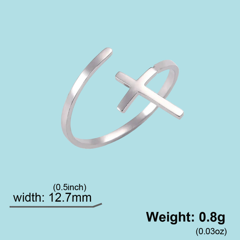 Silver ring with cross design on a white background, showing width and weight measurements.