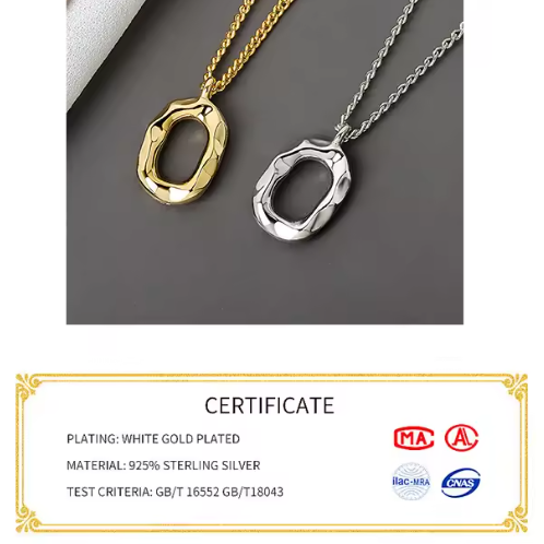 Two necklaces, one gold and one silver, on a gray surface with certification details below.