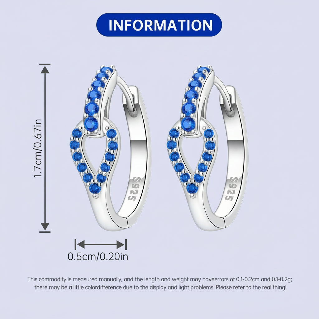 Silver hoop earrings with blue stones and measurement details on a light blue background