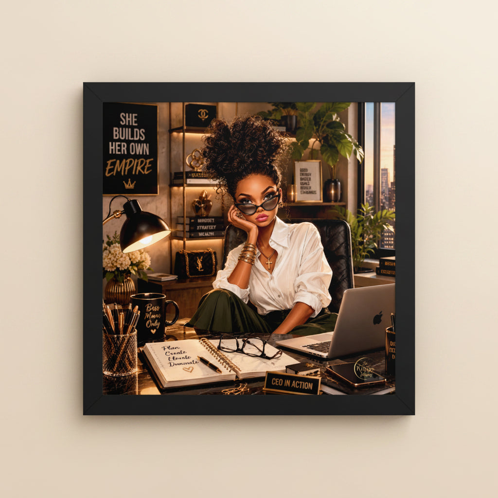 A framed square art print featuring a woman in a stylish office setting, wearing a white shirt and green pants, with a laptop, lamp, and motivational decor. The print is displayed on a clean white background.