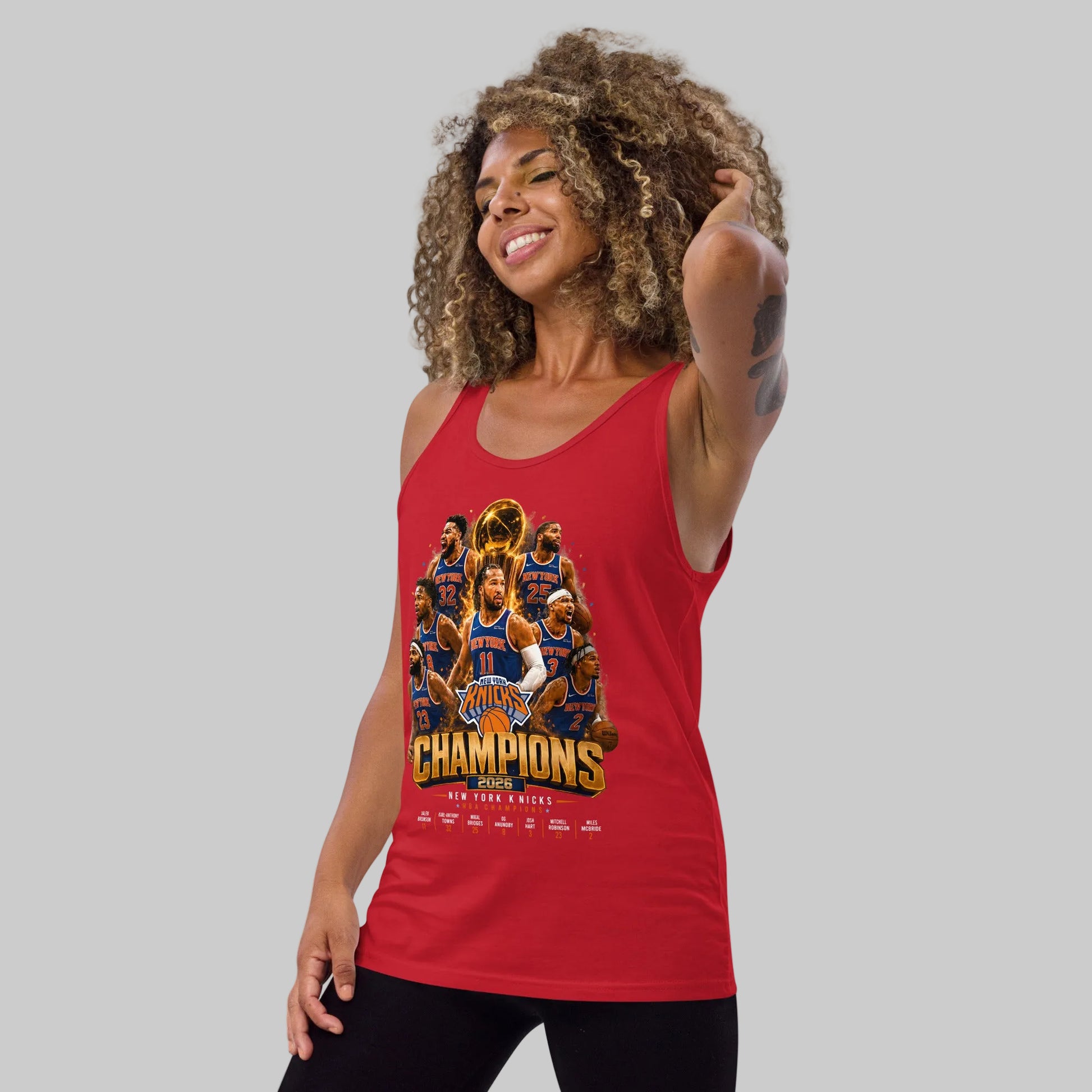 Woman wearing a red tank top with a sports team graphic and 'Champions' text on a white background